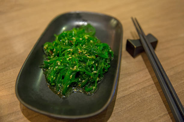 istock Seaweed and chopsticks in focus selective. 1082868168