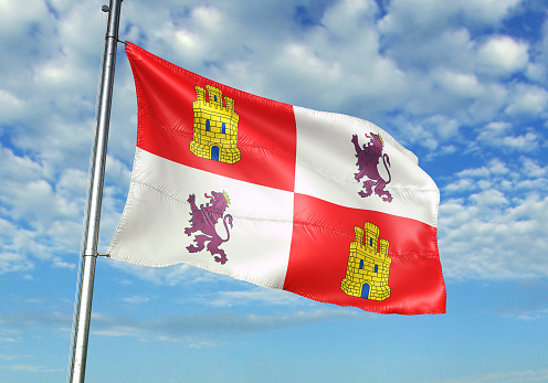 Castilla y León de España bandera ondeando fondo cielo nublado photo