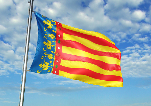 Bandera de comunidad de España Valenciana ondeando nublado cielo de fondo photo