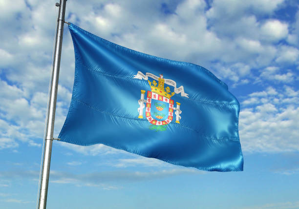 istock Melilla of Spain flag waving cloudy sky background 1082870532