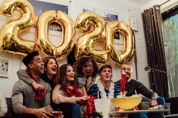 istock Happy young people celebrating new year 1082877432
