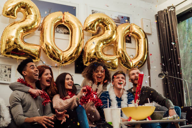 istock Teenagers playing with confetti 1082877562