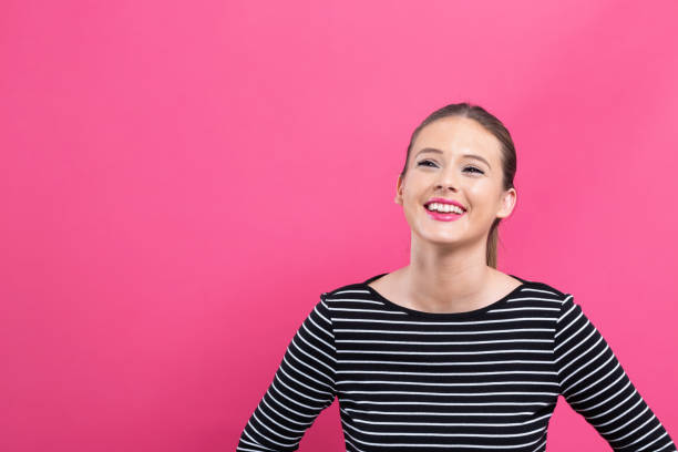 istock Happy young woman 1082883324