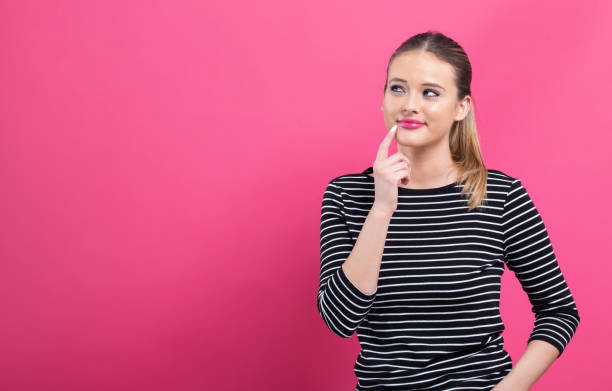 istock Young woman in a thoughtful pose 1082883334