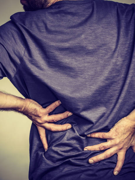 istock Man having back loins pain ache 1082891040