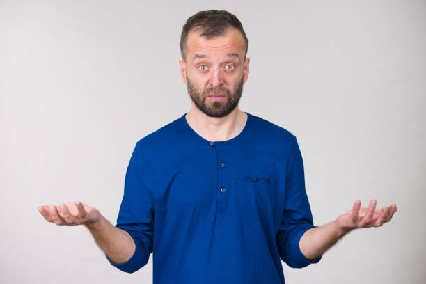 istock Confused adult man seeking for solution 1082891296