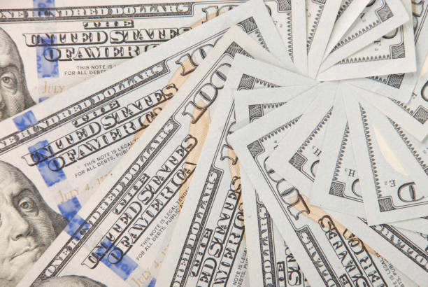istock Mandala kaleidoscope from money. 1082894746