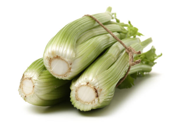 istock Bunch of celery on white background 1082895406