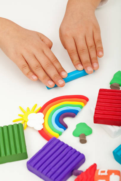 istock Child hands with modelling clay 1082897386