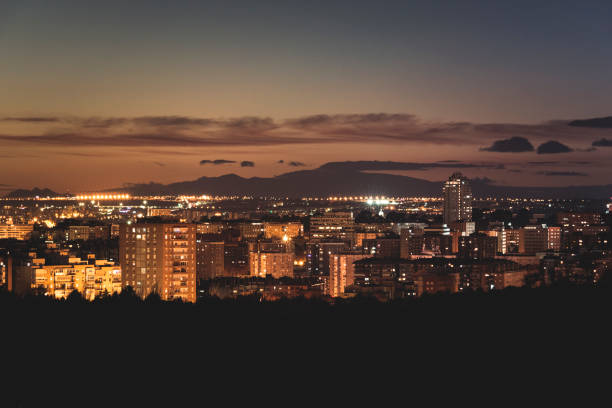 istock Illuminated city at sunset. 1082917628