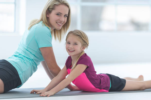 istock Yoga together 1082918484