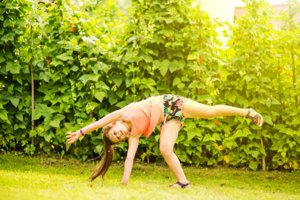 istock Young girl having fun in a park 1082927240