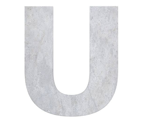 istock Concrete Capital Letter - U isolated on white background . 3D render Illustration 1082927310