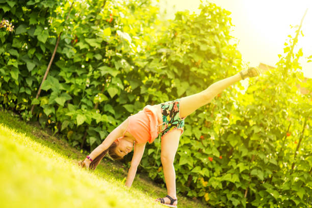 istock Young girl having fun in a park 1082927428