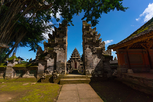 Bali, Indonesia - August 2, 2018: view showing entrance gate of the temple, a Hindu temple in the center of Ubud, Bali
