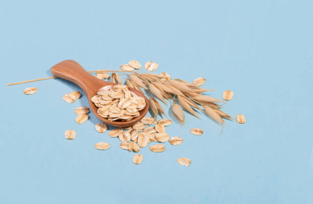 転がされたオートムギ、健康的な朝食シリアルのオーツ麦フレークします。 - oat oatmeal rolled oats oat flake ストックフォトと画像