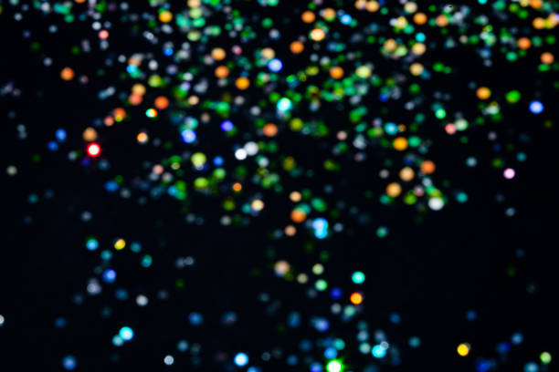 istock Magic lights christmas bokeh on black background. 1082933362