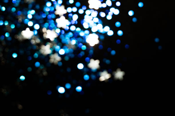 istock Magic lights christmas bokeh on black background. 1082933394