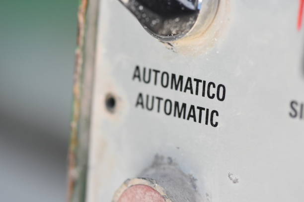 istock operation button of an industrial marble cutting machine 1082934318