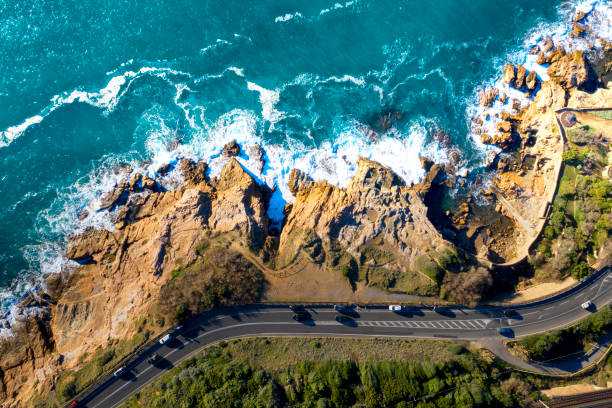 vista aerea dei droni sulla strada costiera in toscana, italia - toscana immagine foto e immagini stock
