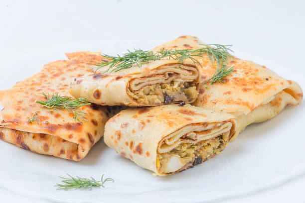 istock Pancakes with potatoes and mushrooms. 1082947992