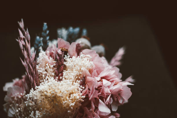 istock a rustic bridal bouquet on a dark background 1082960470