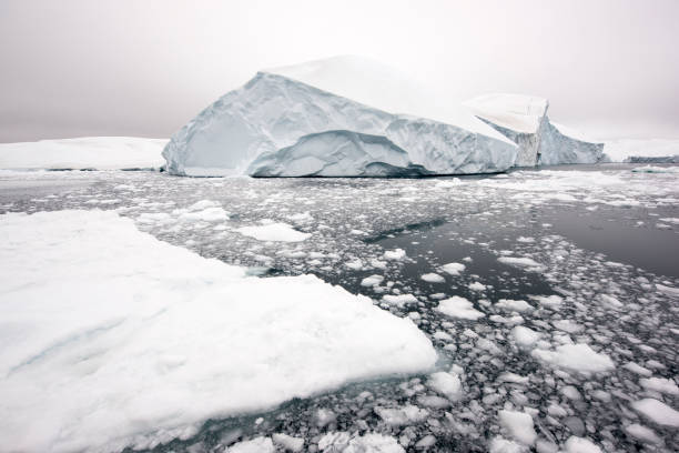 istock Massive Iceberg floating in Arctic Ocean in Greenland 1082968424