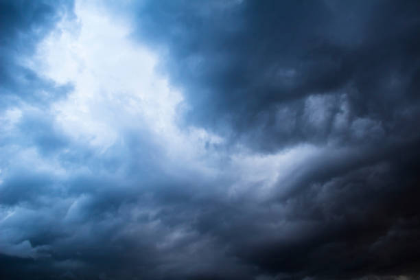 istock Gloomy overcast storm sky background 1082984220