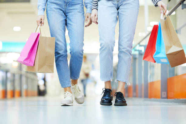 istock Shopaholics in the mall 1082994936