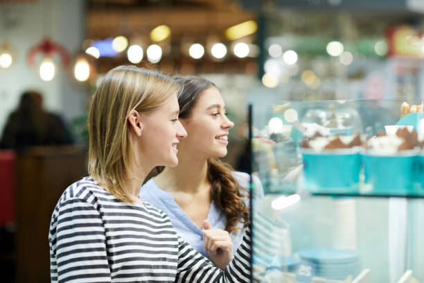 istock Girls in cafeteria 1082994946