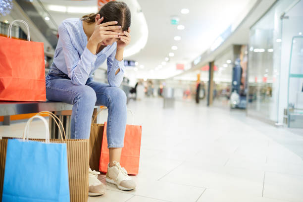 extracción comercial - adicto a las compras fotografías e imágenes de stock