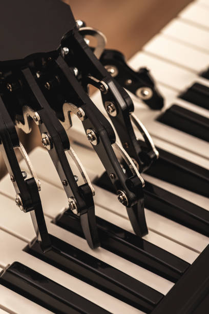 istock Human with neural hand prosthesis playing piano 1082998744