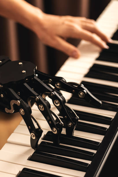 istock Human with neural hand prosthesis playing piano 1082998816