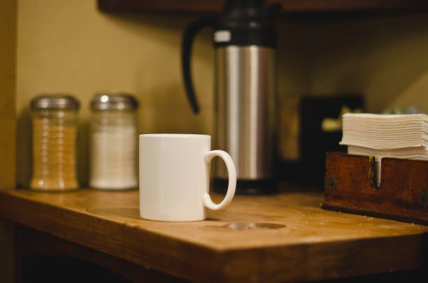 istock The blank white mug at the coffee shop 1083000648