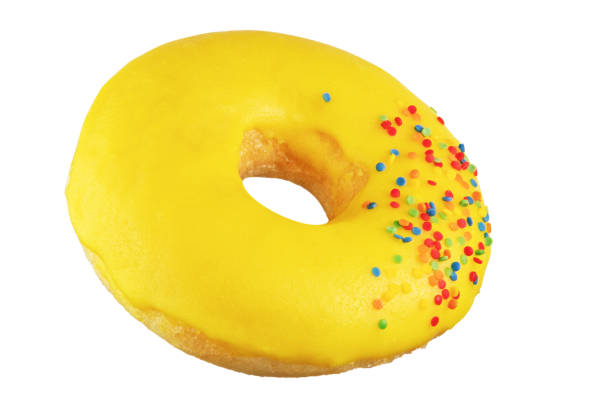 istock Isolated donut with yellow frosting, sprinkling. shot on the stack. Photographed by stacking. 1083014668