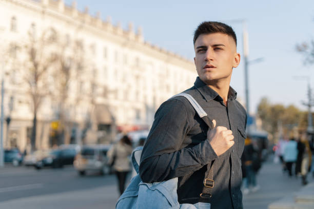 istock A man traveler with his backpack exploring city 1083028406