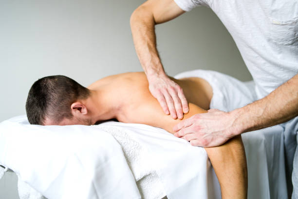 istock Young Man Having Arm Massage At Spa 1083046872