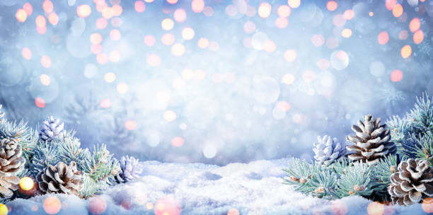 istock Winter Background With Fir Branches On Snow And Lights 1083055776