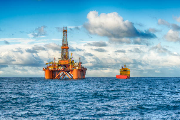 istock Offshore oil rig and suplly ship 1083059838