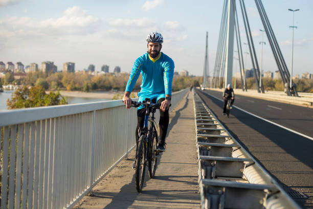 Bike Rider Bridge 30,800+ Bike City Bridge Stock Photos, Pictures & Royalty-Free Images ...