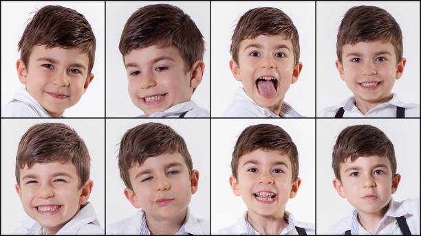 istock Little boy making various facial expressions 1083067394