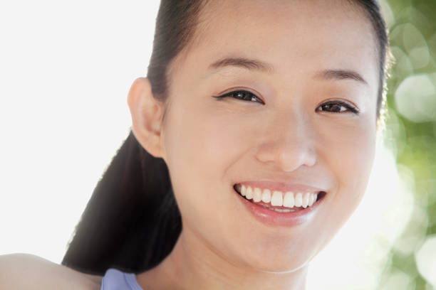istock Smiling Chinese woman portrait 1083072904
