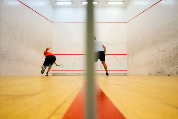 istock Two friends playing squash in Mutilva, Navarra, Spain 1083081836