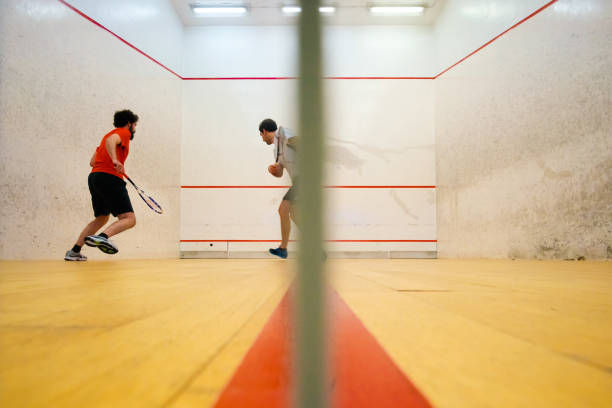 istock Two friends playing squash in Mutilva, Navarra, Spain 1083081896