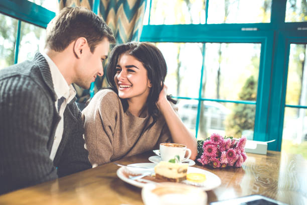 istock The happy couple relax in the cafe 1083081996