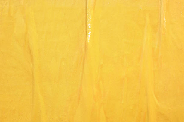 istock Blank yellow old ripped torn paper crumpled creased posters grunge textures backdrop backgrounds placard 1083082730