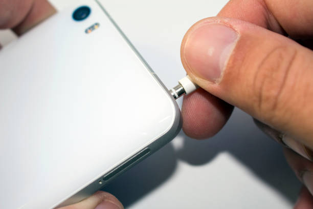 istock To insert earphones into the smartphone 1083085520