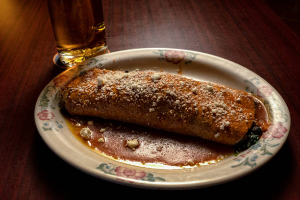 Delicious Giant Burrito in a Mexican Restaurant with savory sauce