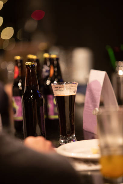 istock Beer glasses with dark beer are on the bar counter 1083089384