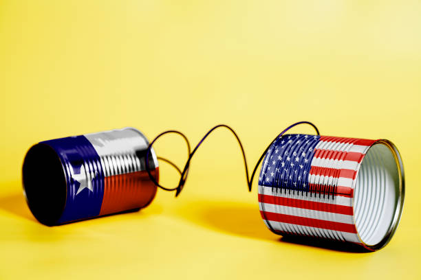 istock tin can phone with USA and Texas U.S. state Flags. communication concept 1083091362